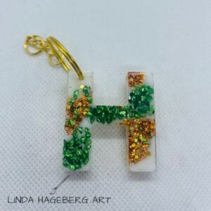 Nøkkelring H, kobber og grønn