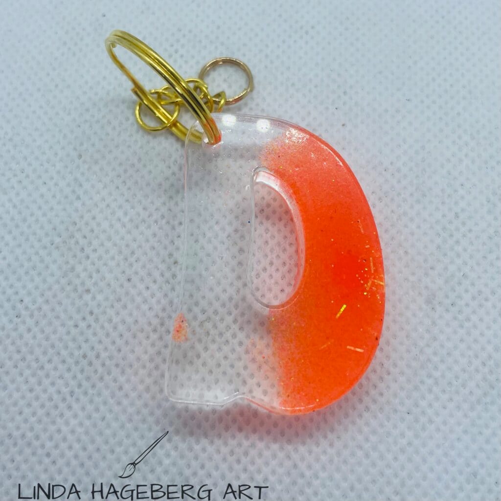 Nøkkelring D, orange neon