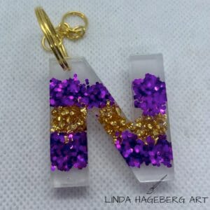 Nøkkelring N, lilla og gull