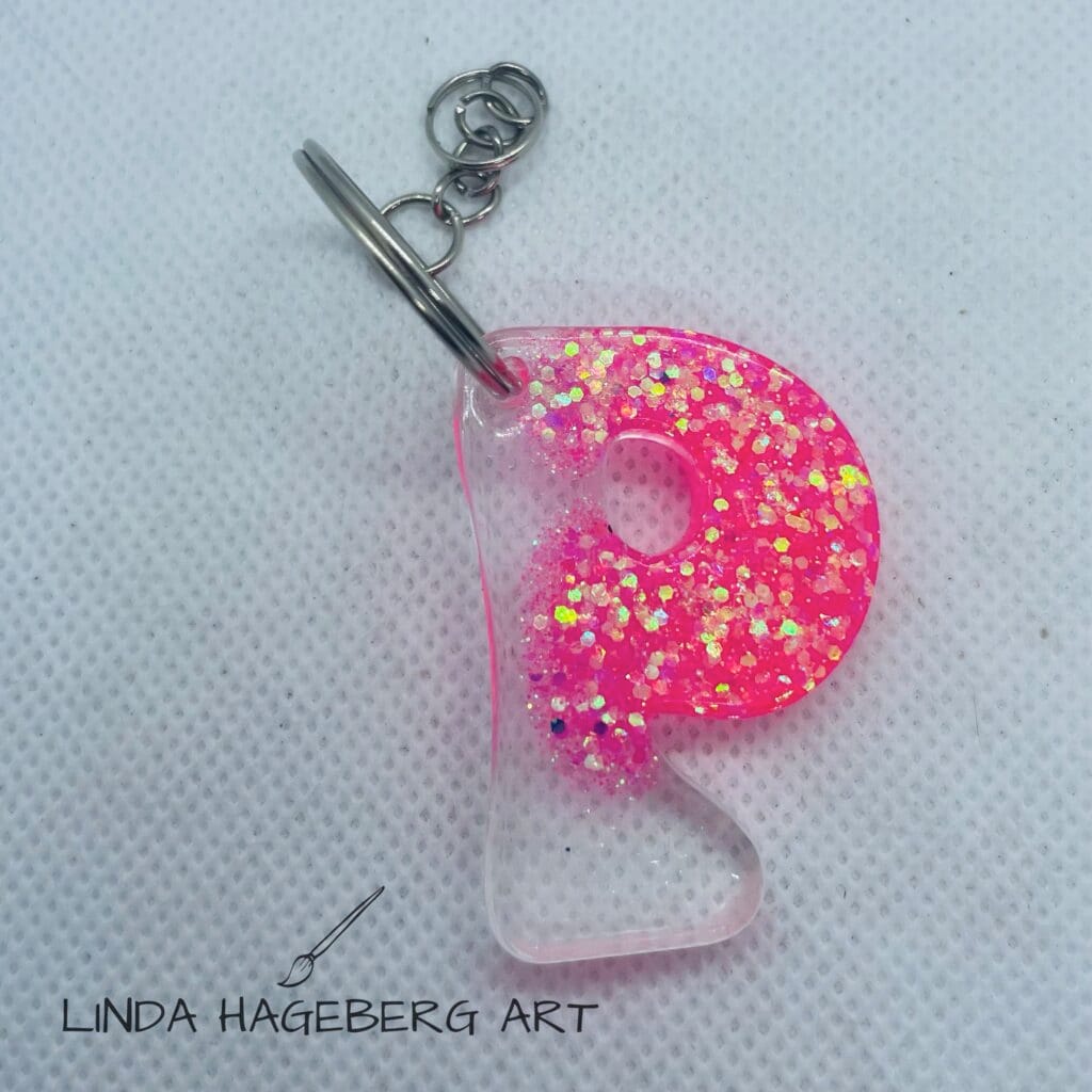 Nøkkelring P, rosa neon