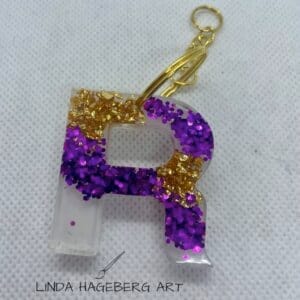 Nøkkelring R, lilla og gull